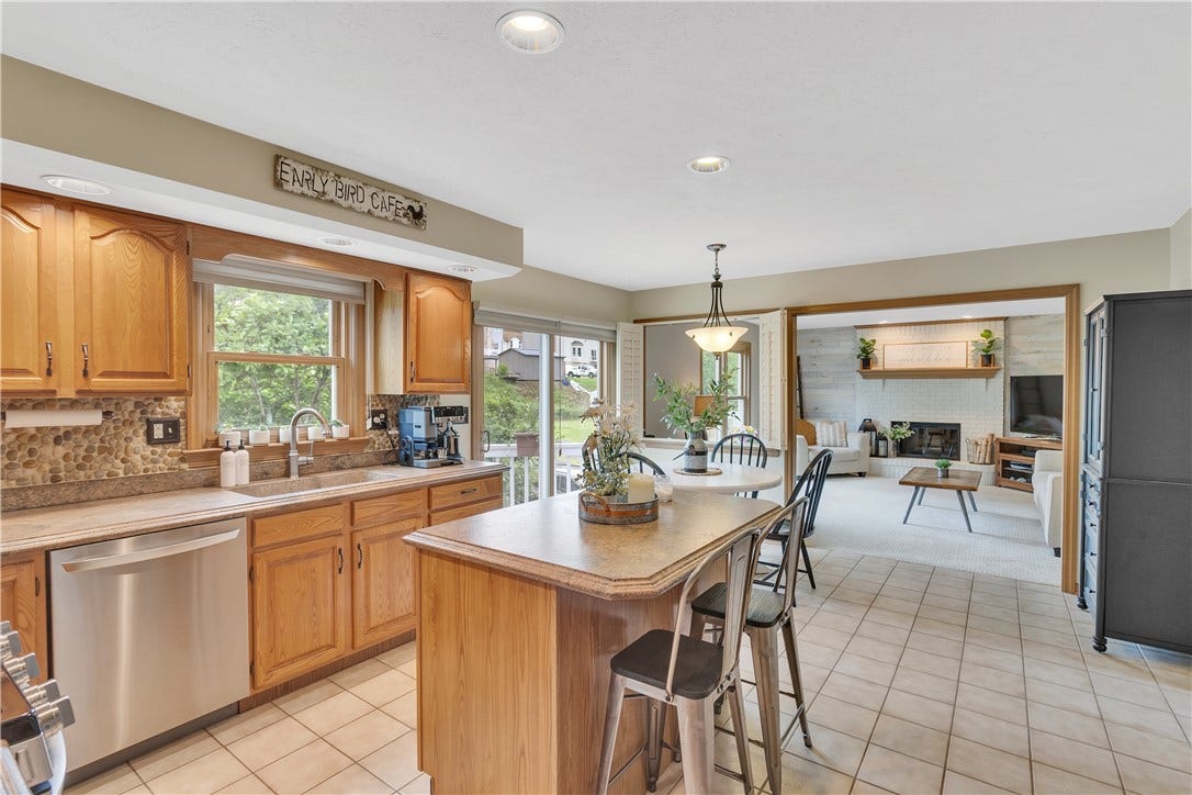 3 Sarah Ct., Irwin, PA 15642 18x13 with Tile Floor and Slider that Opens to Deck for Easy Indoor/Outdoor Entertaining.