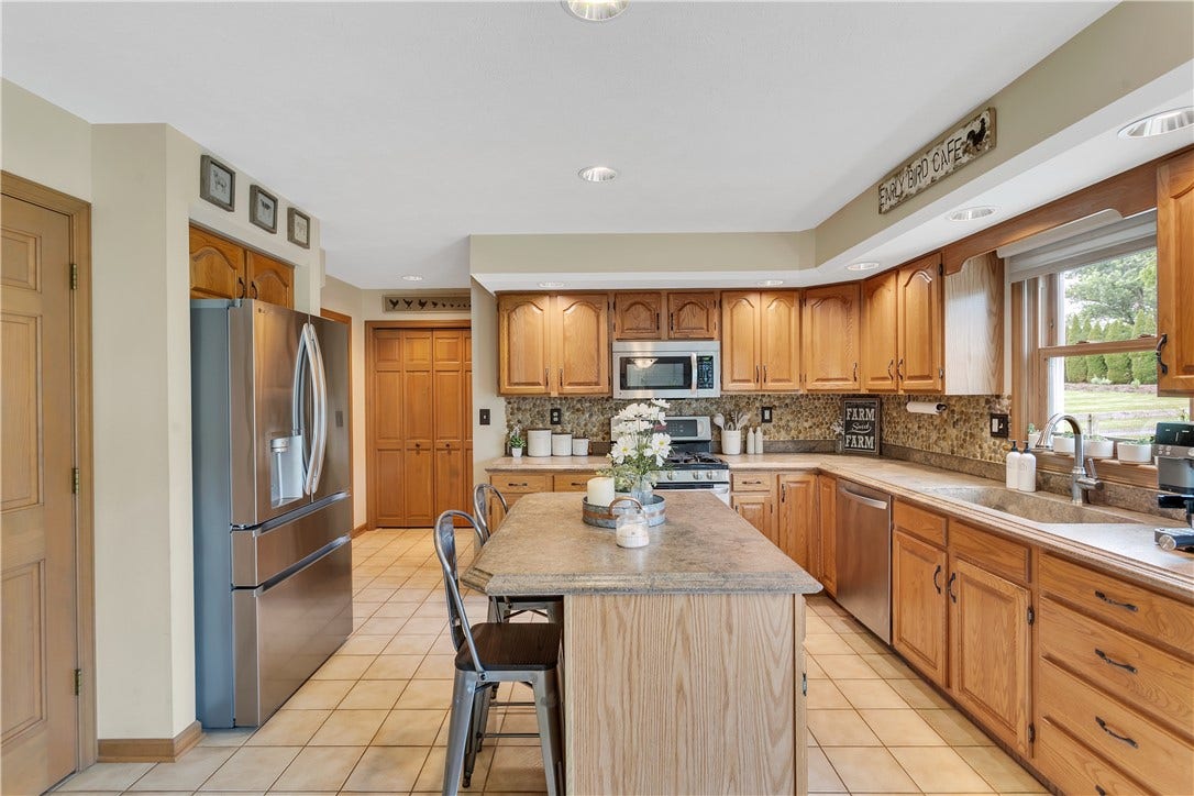 3 Sarah Ct., Irwin, PA 15642 Pantry Area and First Floor Laundry at Far of Kitchen.