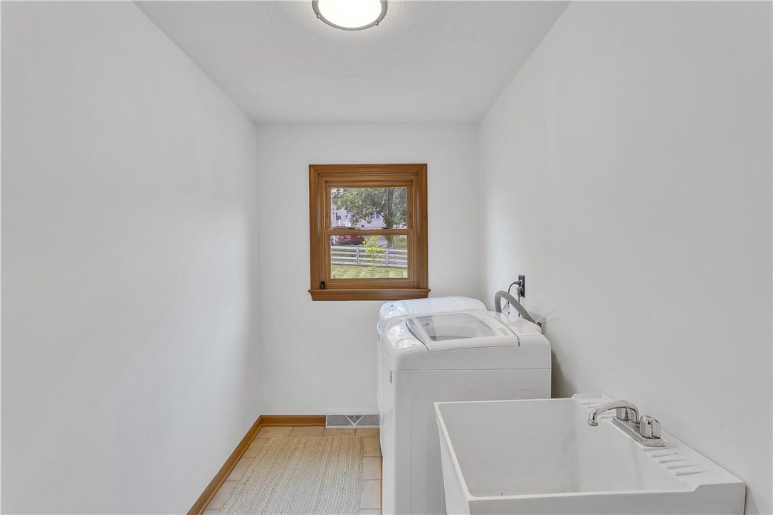 3 Sarah Ct., Irwin, PA 15642 Main Floor Laundry with Utility Sink and Window.
