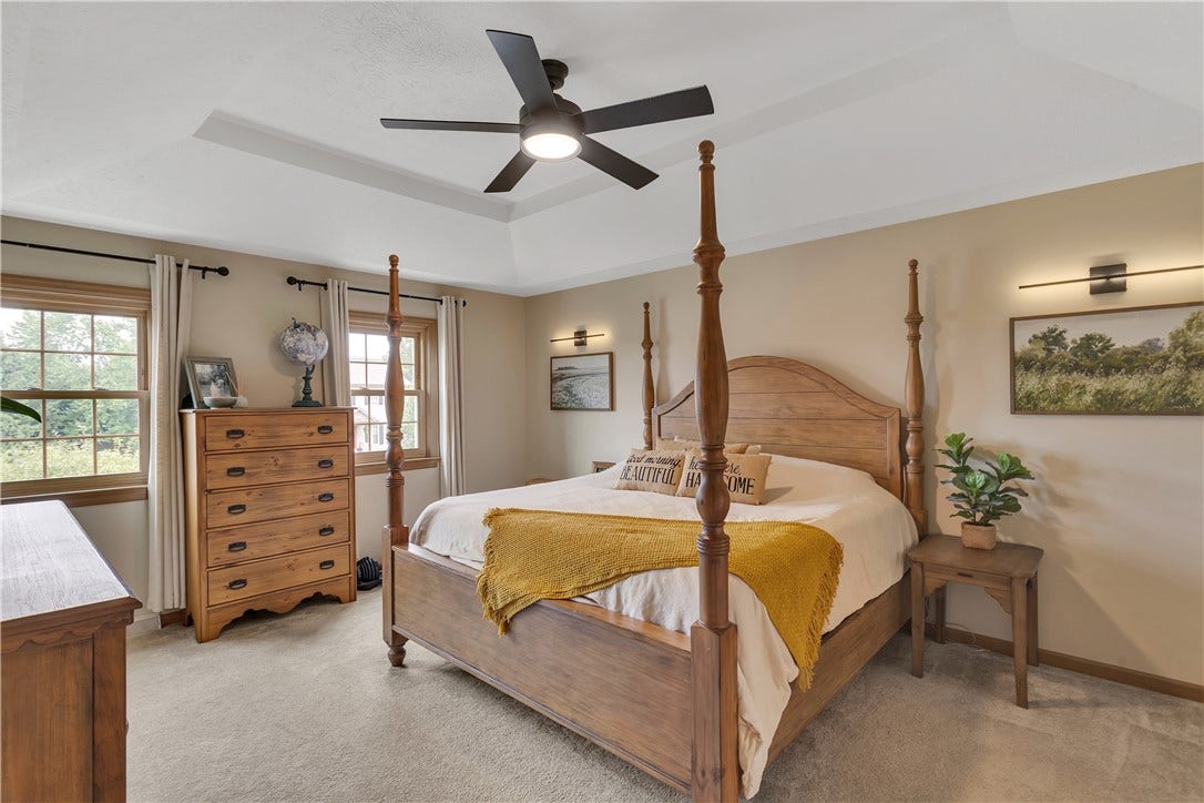 20x13 Primary Suite with Updated Fan and Tray Ceiling.
