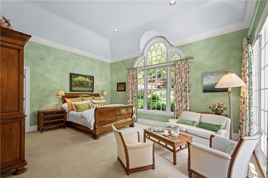 Located on the main floor, this Primary Bedroom is a true retreat.