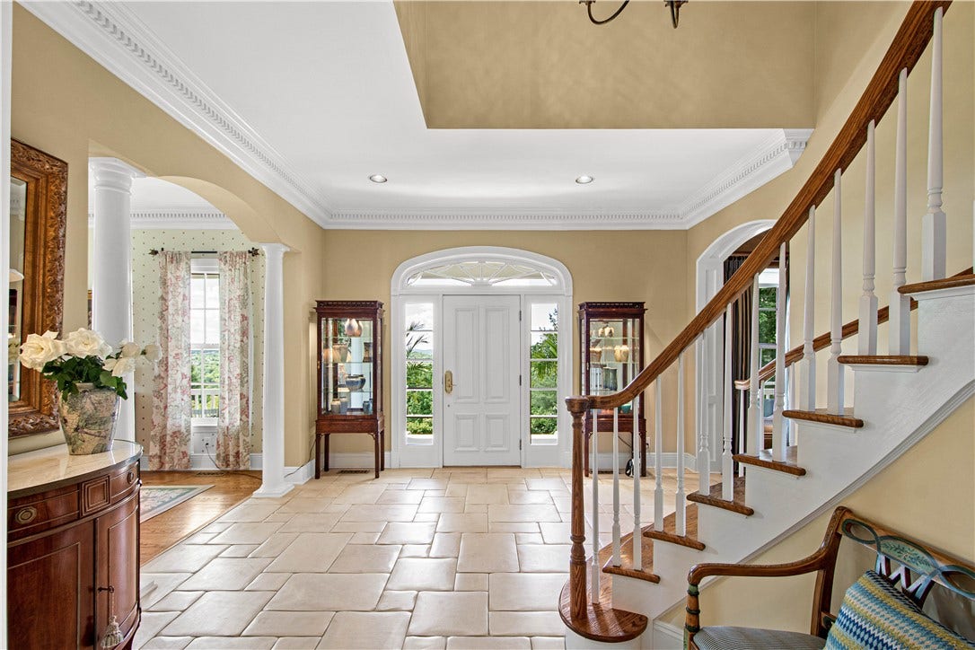 The limestone flooring was hand pillowed on site to create old world charm.