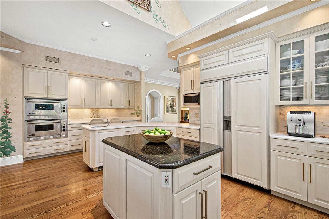 A convenient center island offers additional workspace.