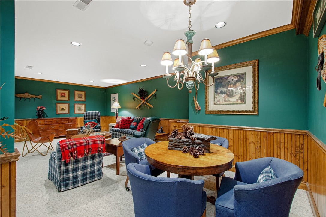 The lowe level game room would be a perfect spot to catch a great movie or cheer on your favorite sports team.