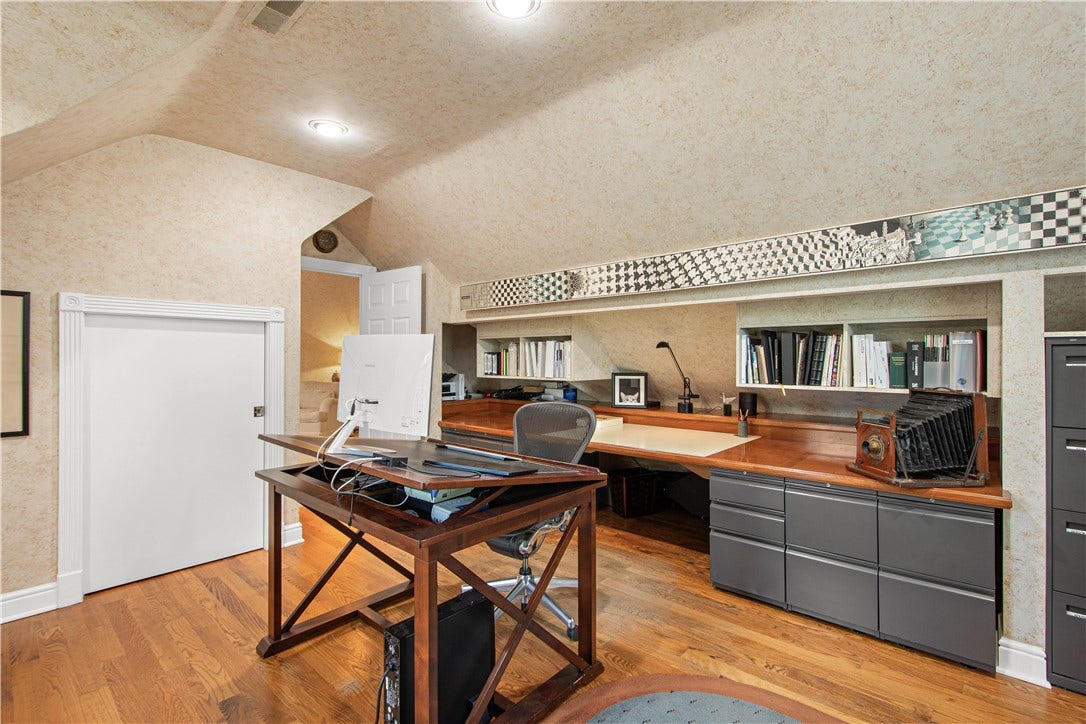 The 4th bedroom on the 2nd floor is currently used as a second home office.