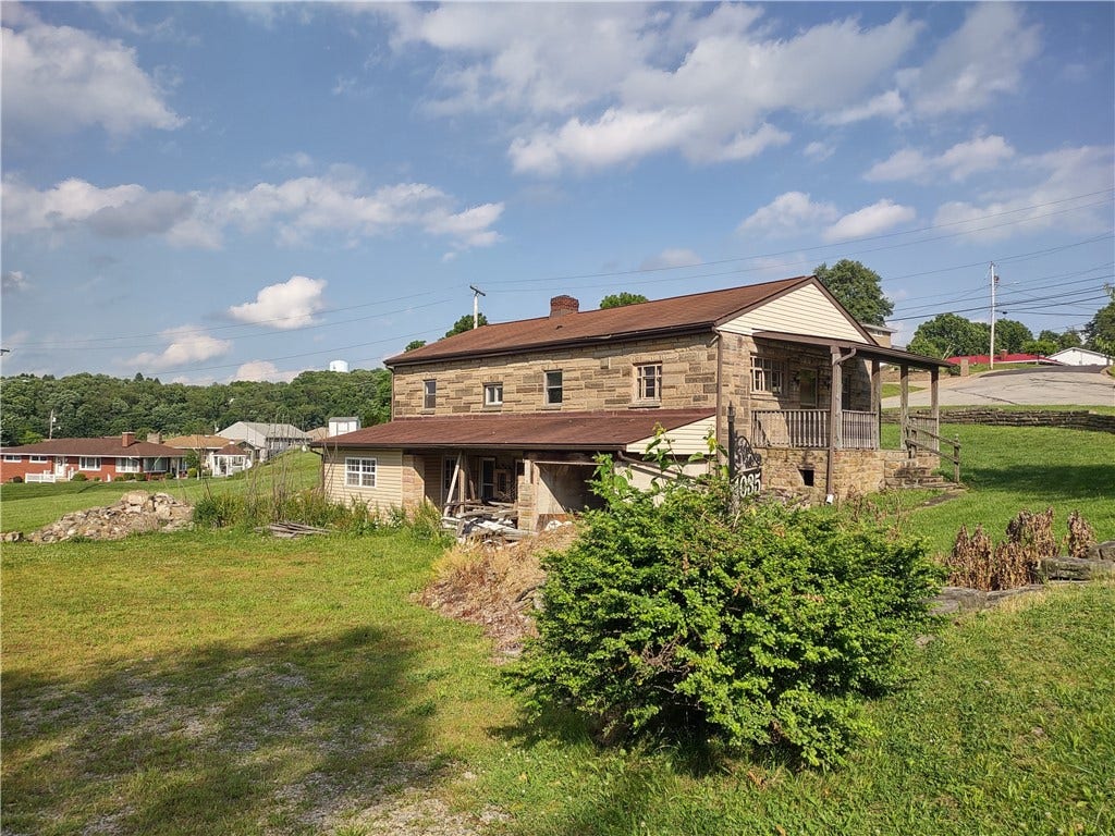Stome Home Sits on Four lots.