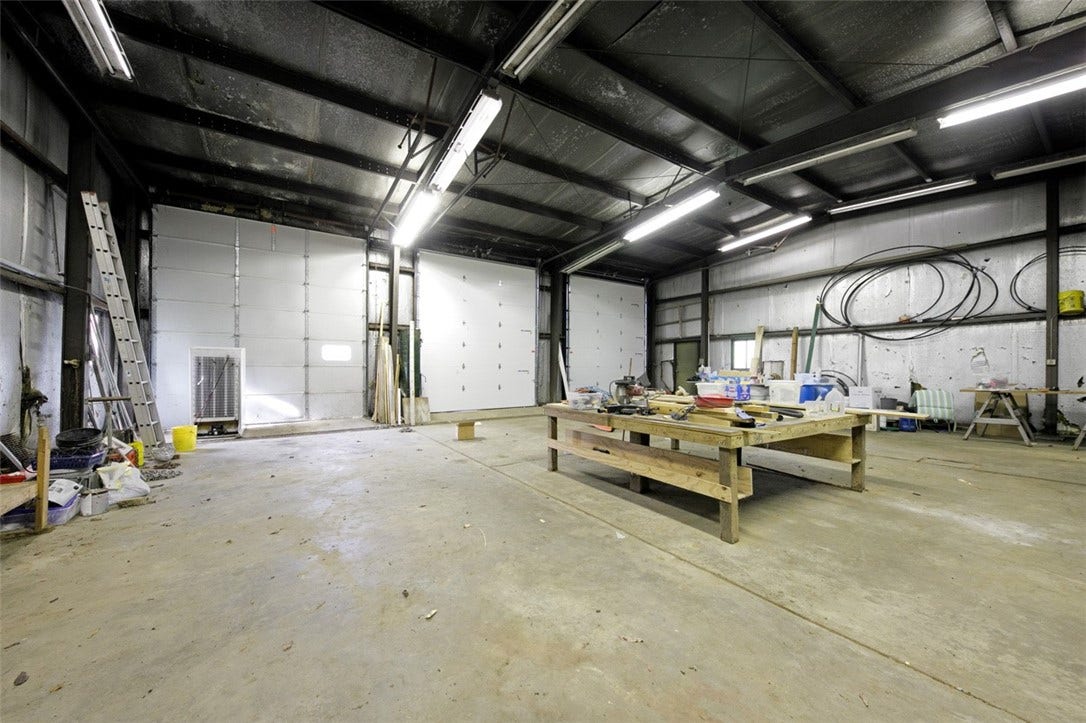 3- 14 ft doors on Industrial size Garage