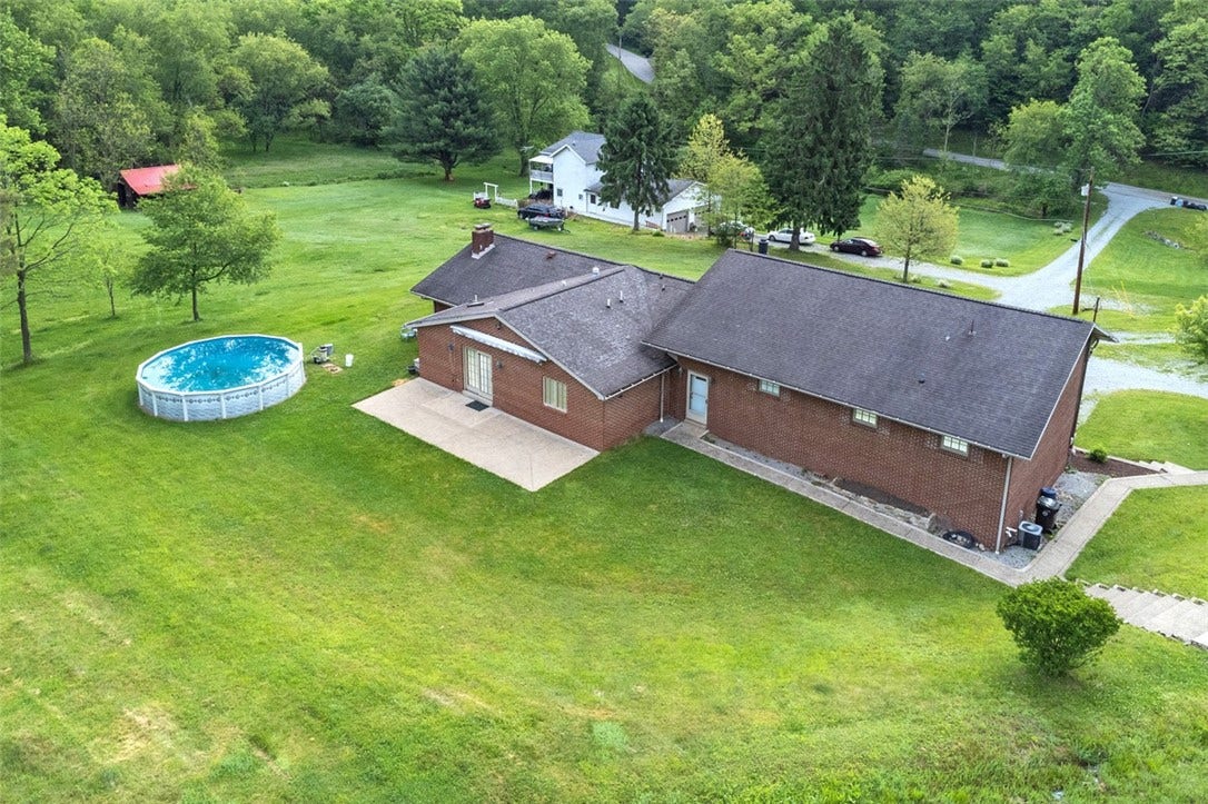 30 x13 Rear Patio with Sunsetter awning and above ground Pool