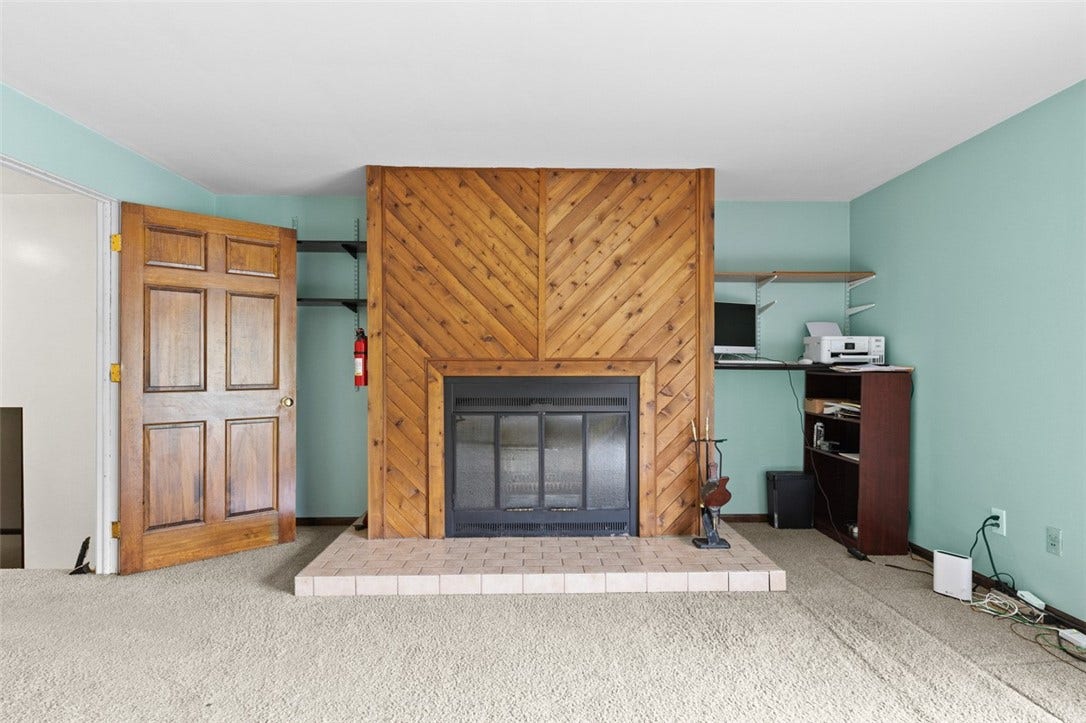 Log burning Fireplace at one end of Master suite