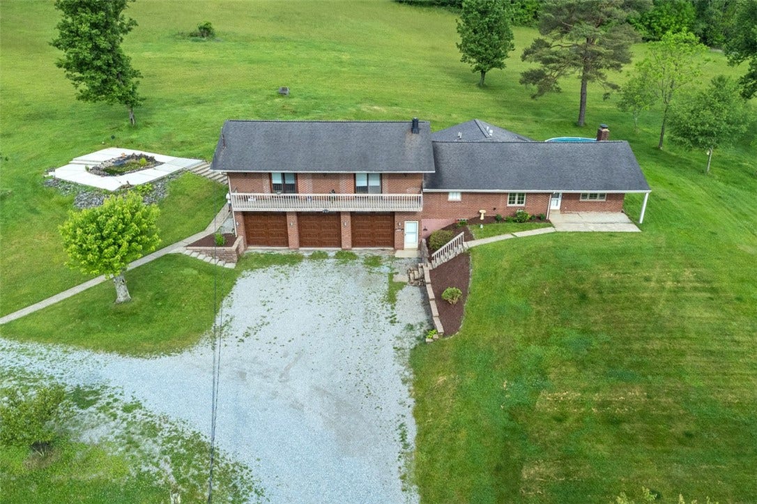 Fish pond to left of house, front Balcony and Covered front porch