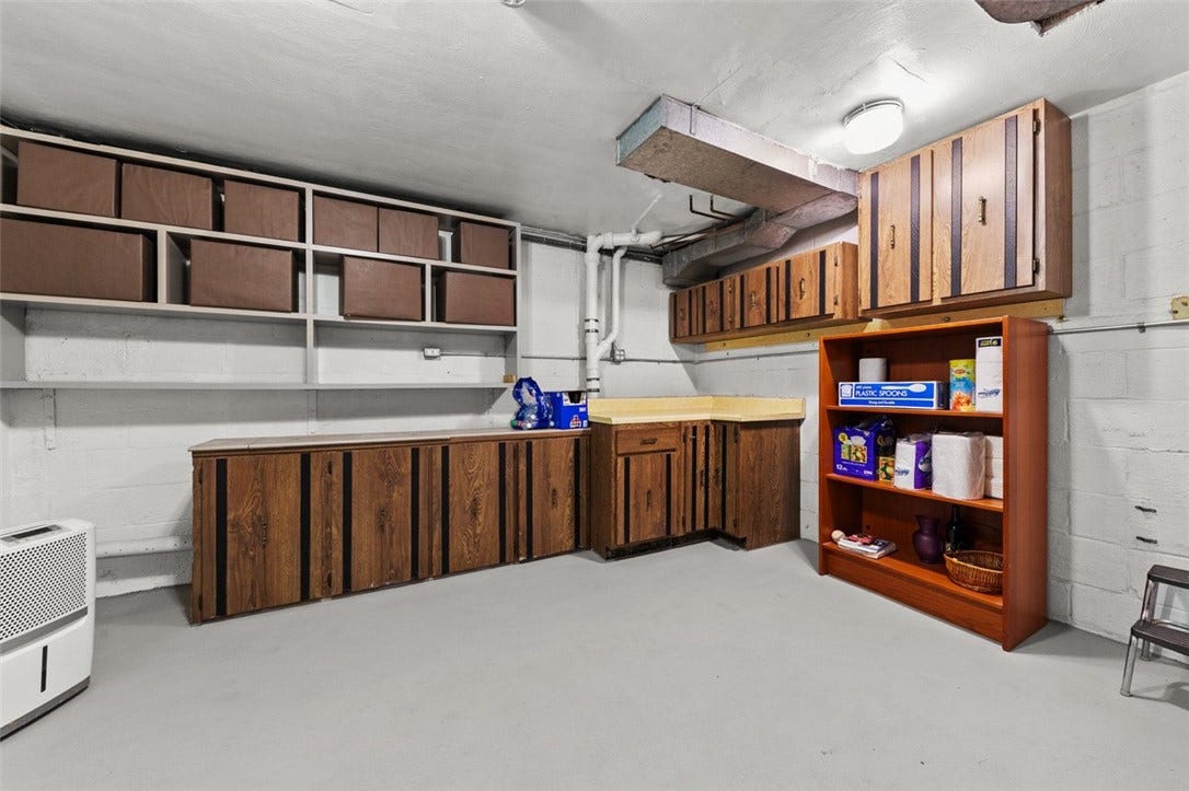 Built in Shelving  and Cabinets in this storage area
