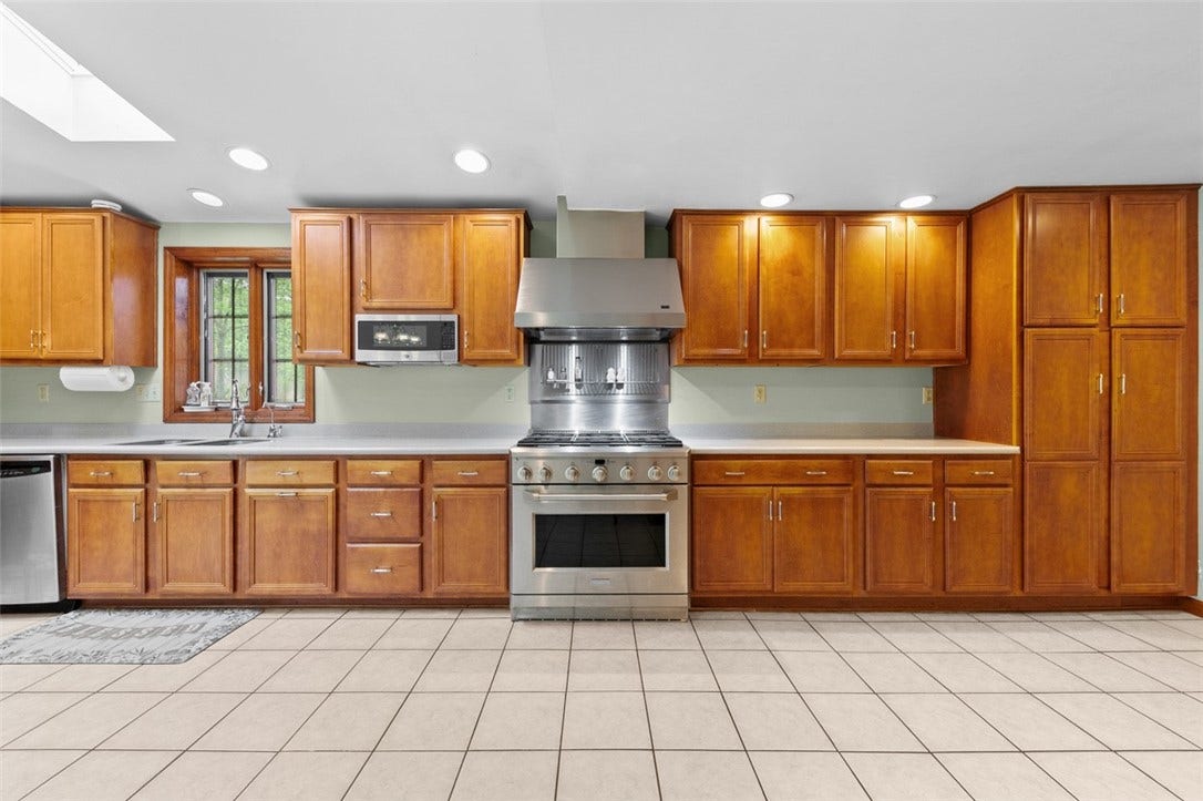Monogram 6 Burner Gas stove with Vented Hood