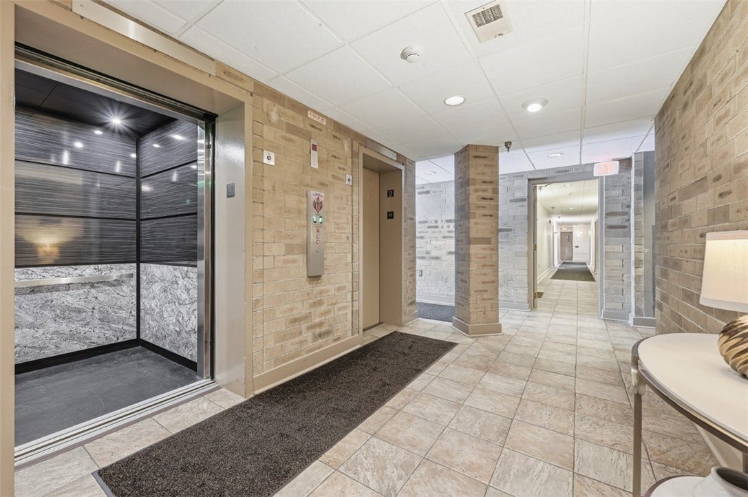 1400 Smokey Wood Dr, #601, Pittsburgh, PA 15218 Rear of the lobby there are two luxury elevators!