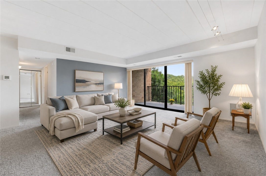 1400 Smokey Wood Dr, #601, Pittsburgh, PA 15218 digitally furnished; spacious square-shaped living room offering a versatile layout that easily accommodates a variety of furniture arrangements.
