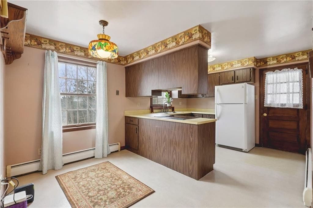Kitchen includes light & bright Breakfast Nook