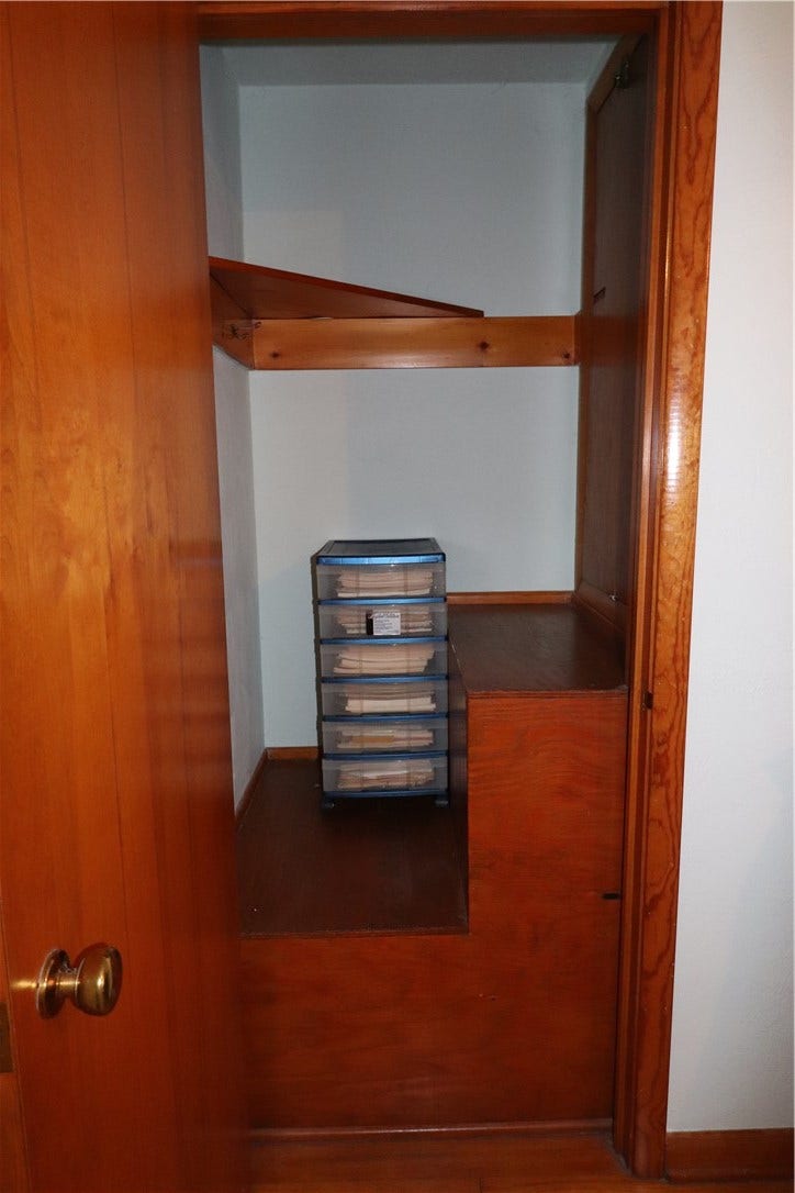 Bedroom with access to the attic.