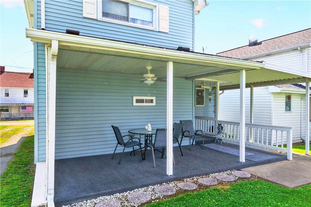 The steps to the basement are on the right side of the white railing.