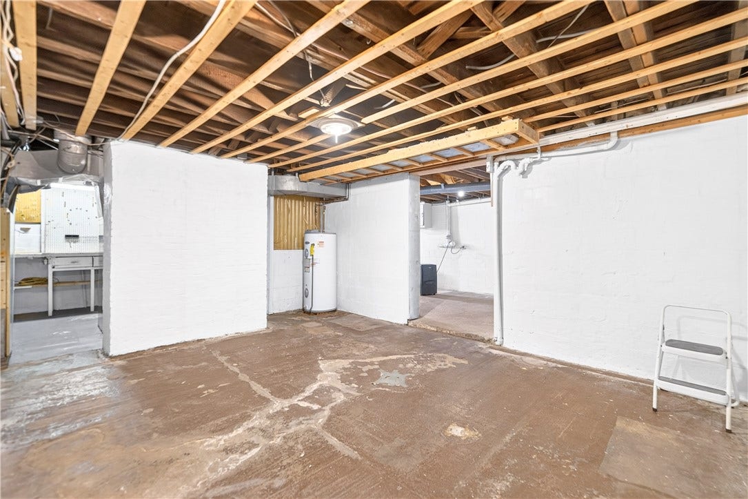 This is the first room when you come down into the basement from the steps in the kitchen.  It can be finished to give you additional living space.