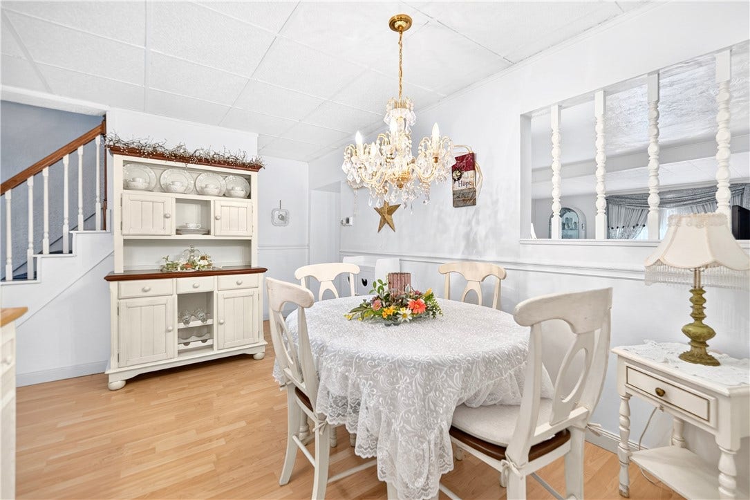 This spacious eat in kitchen provides plenty of room for a large table and chairs.