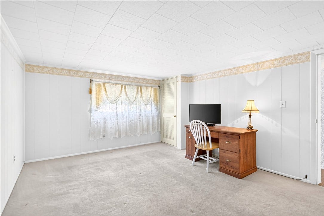 The second bedroom is located upstairs.  It's big enough for all of your furniture.