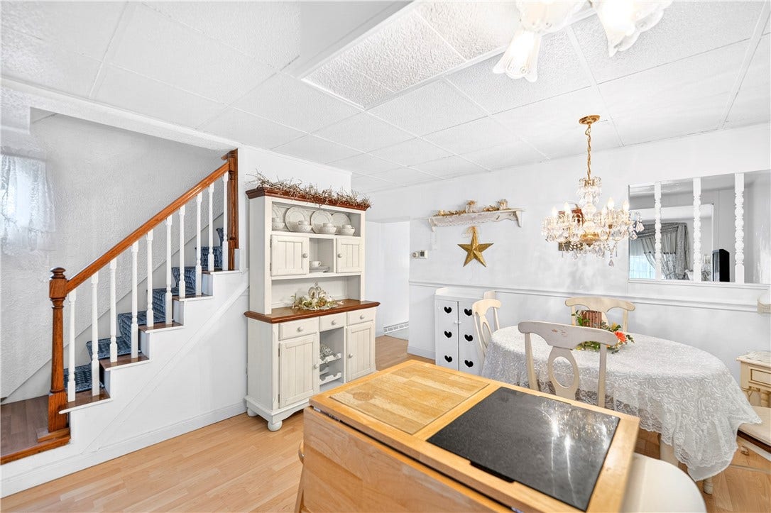 The kitchen has an open window into the living room so everyone feels welcome and included.