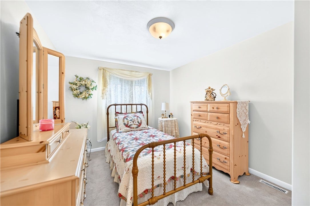 It currently has a twin bed in it, but it is big enough to hold a larger one if needed.