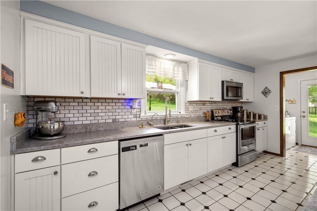 Crisp white custom cabinets.
