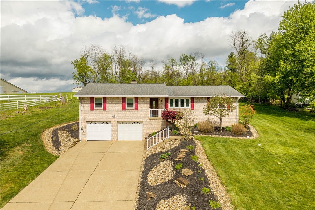 Welcome to this all brick ranch with an abundance of curb appeal.