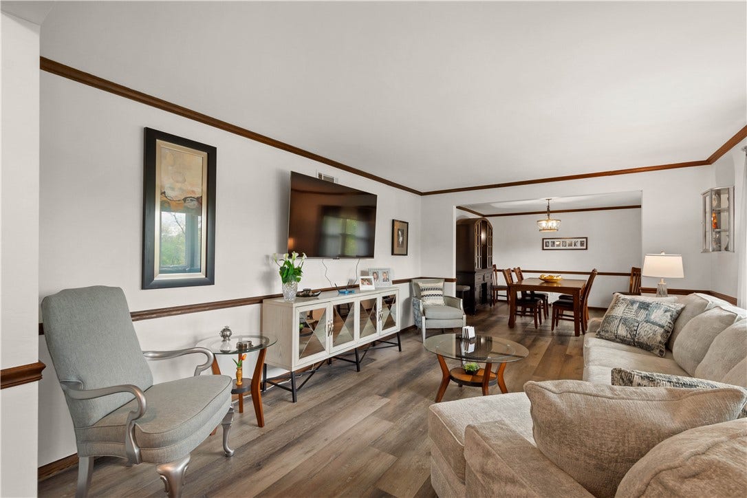 Large formal family and dining room with tons of natural light.