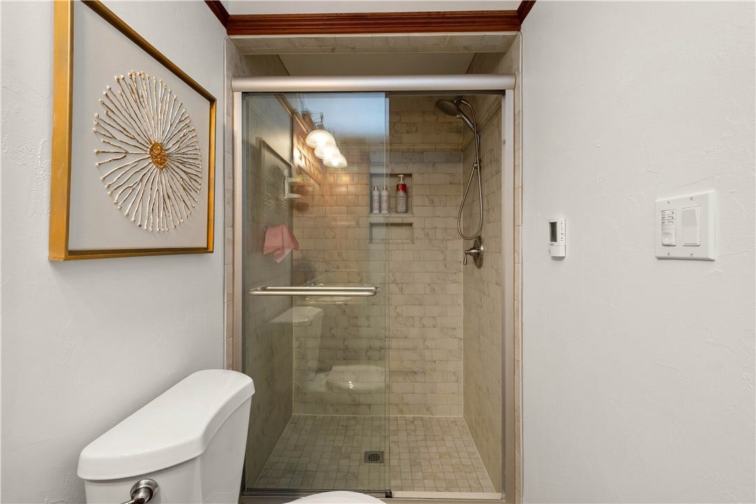 Walk in shower in the primary.