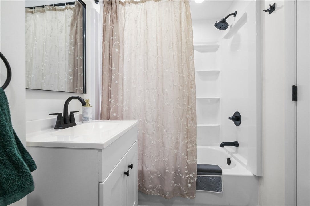 Basement full bath was also completely updated and provides a bathtub!