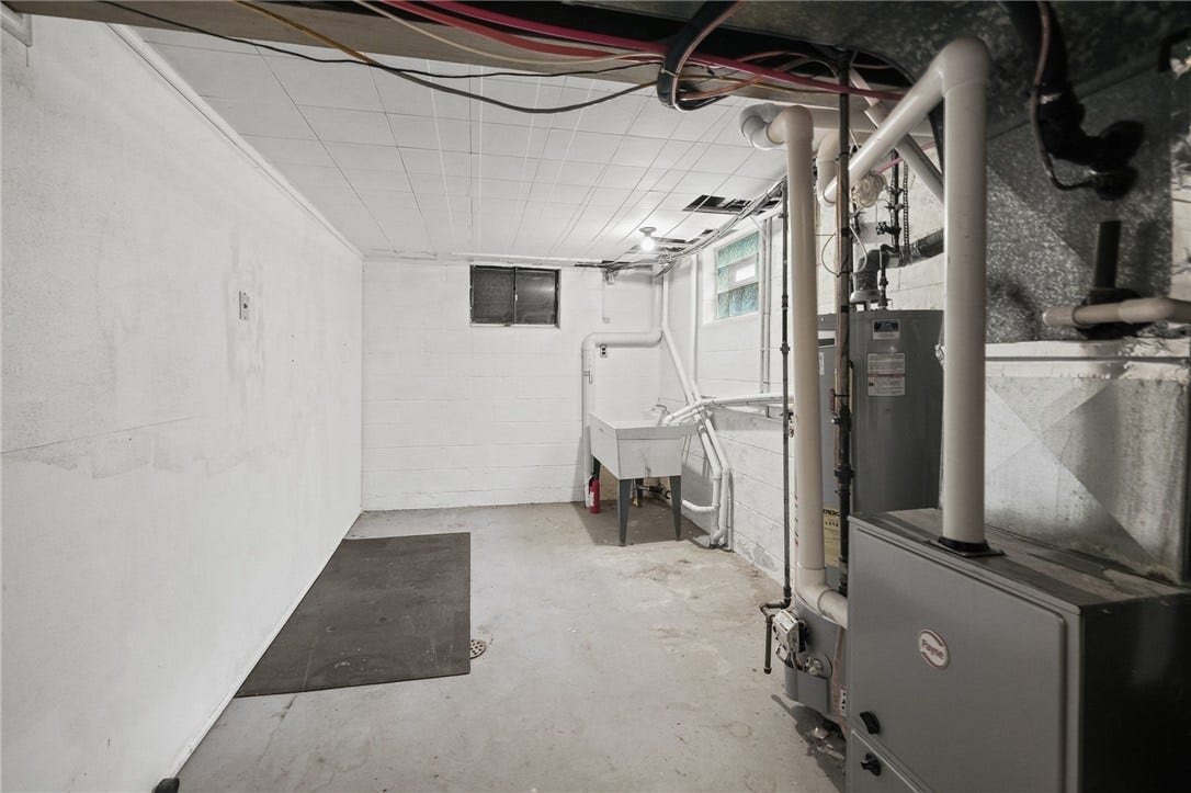 The laundry can be relocated to the utility room in the basement, if desired.