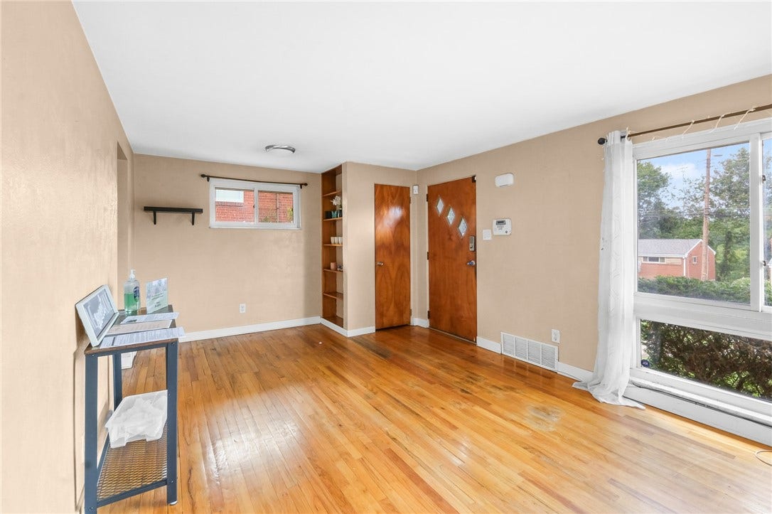 A coat closet is conveniently located near the front door.