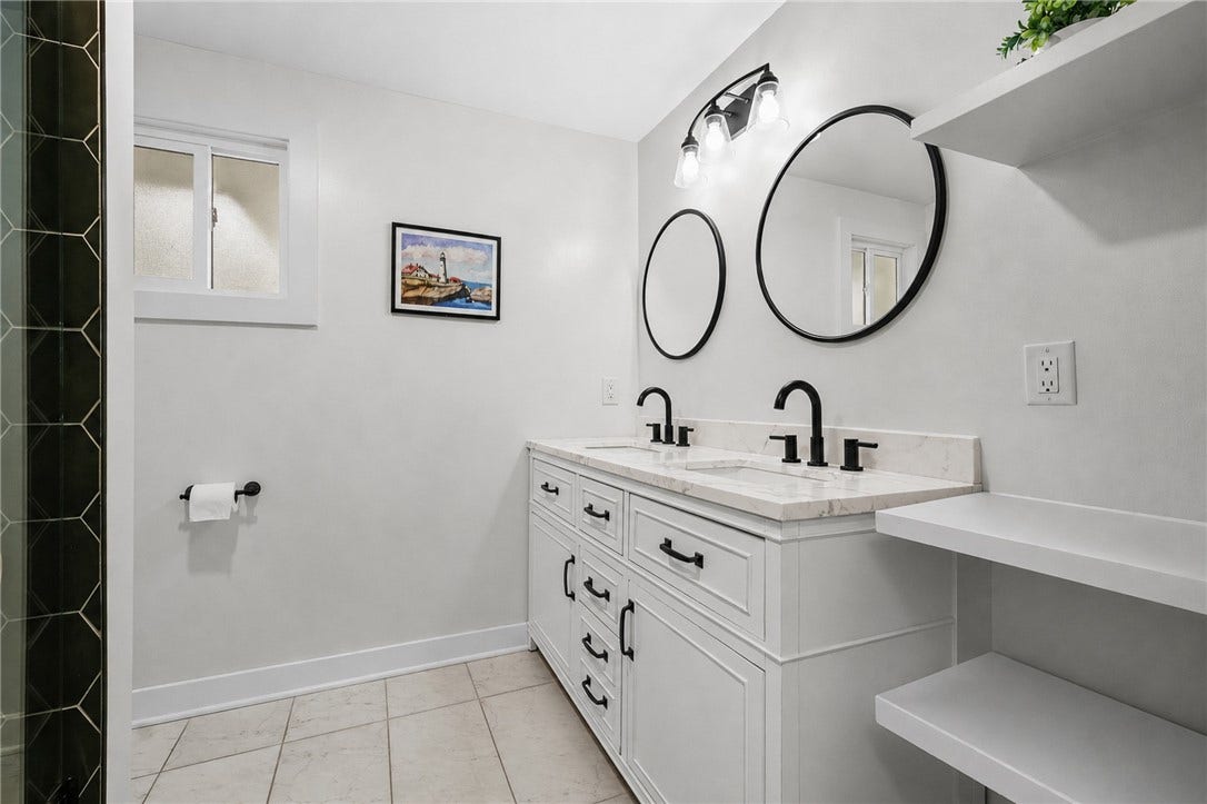 Sellers expanded & completely remodeled this bathroom!