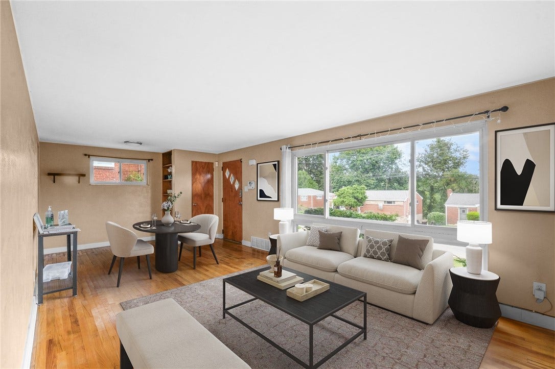 Room to relax and dine in this beautiful living room.