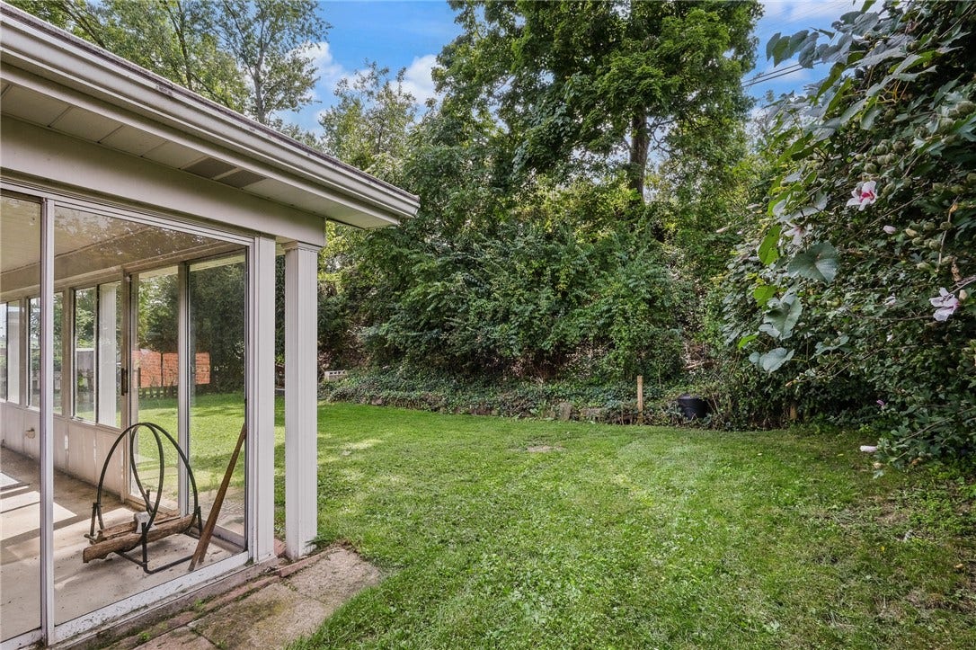 The perfect yard - level and private! Perfect for a swimming pool and lawn games.
