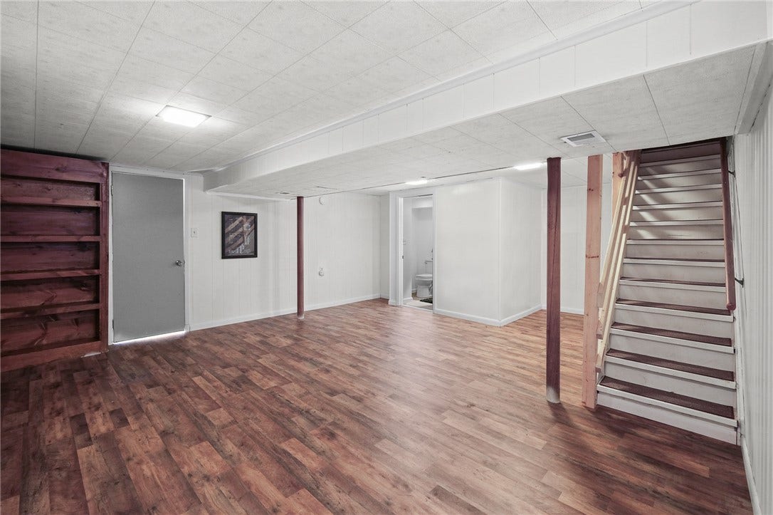 Sellers installed new Luxury vinyl tile in the basement and painted all the walls.