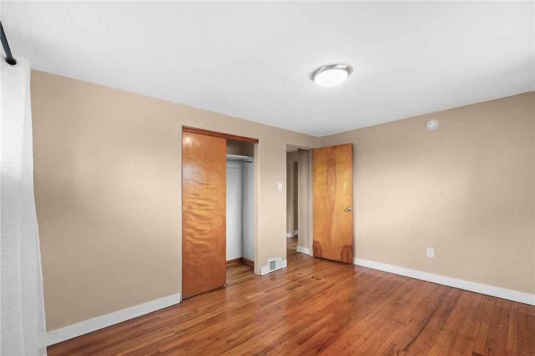 Another view of primary bedroom showing the large closet.