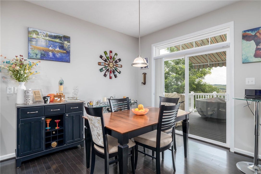 Dining area with a view! Leads right out to your maintenance free deck.