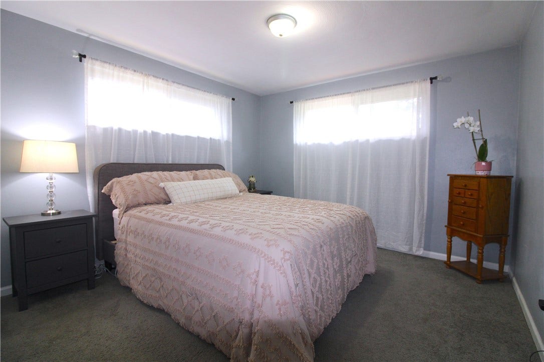 Main floor primary bedroom with large closet.