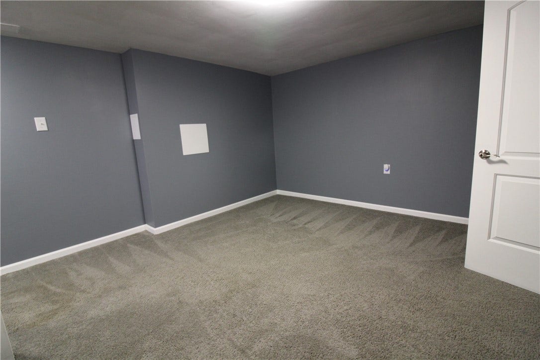 Same lower level without the staging.  Fresh paint and neutral carpet.