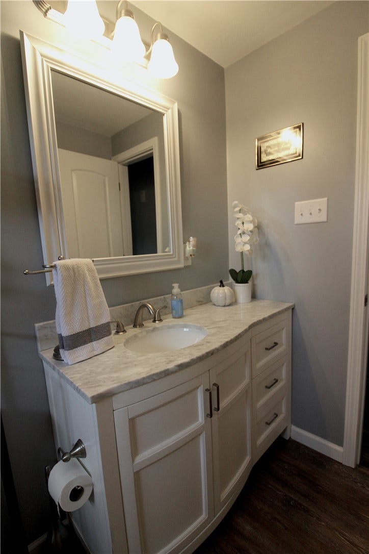 Nice sized vanity with additional storage and drawers.