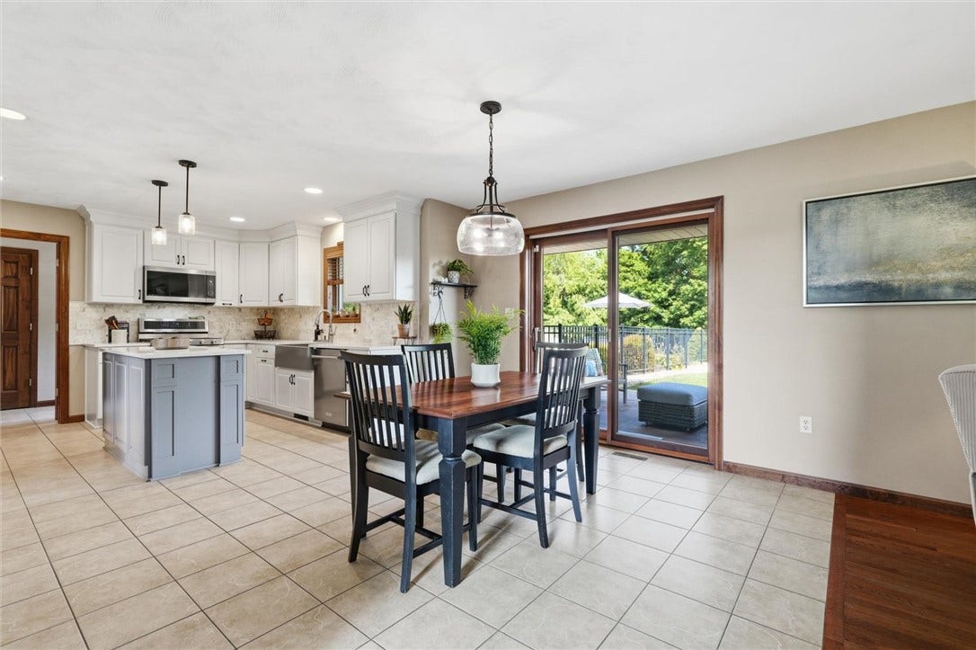 Eat in Kitchen with Pella Slider that Opens to the Covered Patio, Pool and Yard - Ideal for Entertaining.