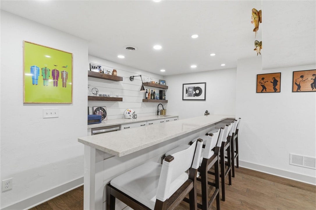 Recessed Lighting Brightens the Space - Stools Included - Soft Close Drawers and Doors on the Bar Cabinets.