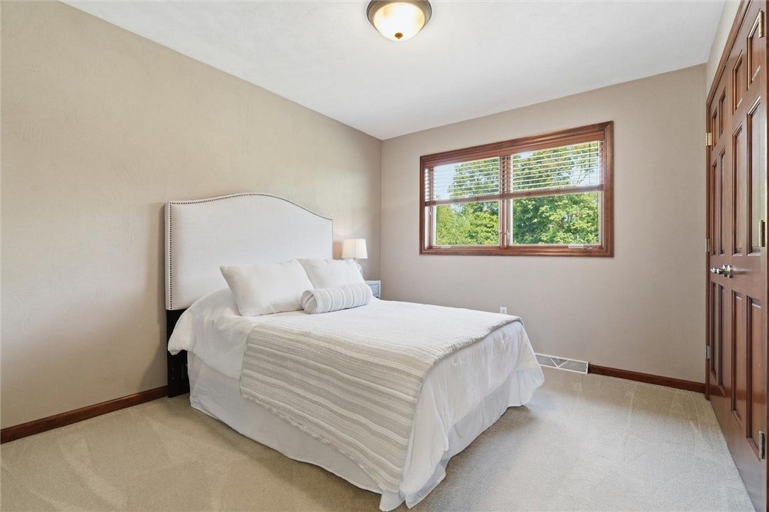 12x10 Bedroom #4 with Large Double Closet. ALL Interior Doors are 6 Panel, Solid Wood.
