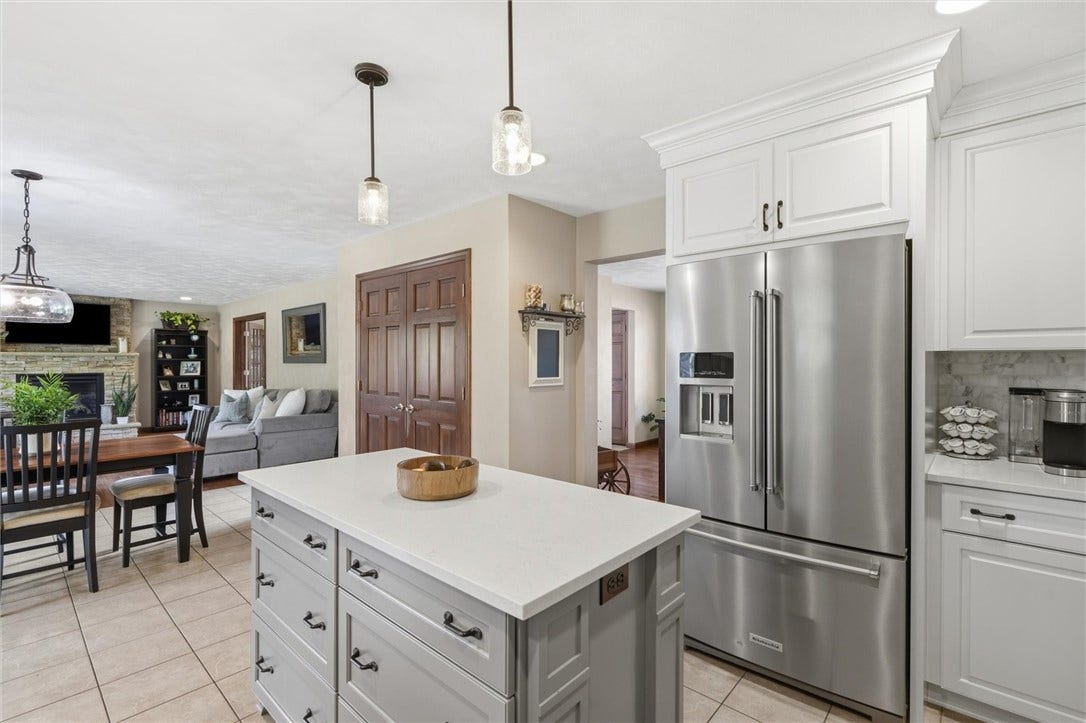 Large Double Pantry and Coffee Nook in the Kitchen. Adjacent Dining Room for Formal Entertaining.
