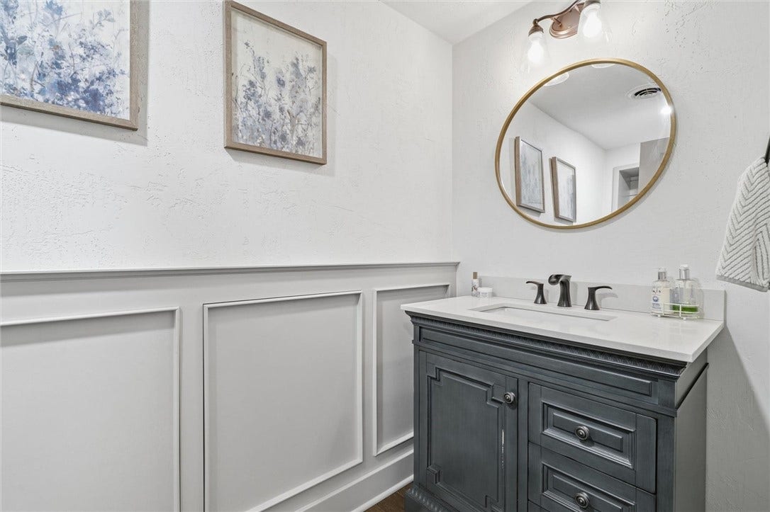 Convenient 1/2 Bath in Finished Basement Just Steps from the Walk Up Door to the Yard/Pool.