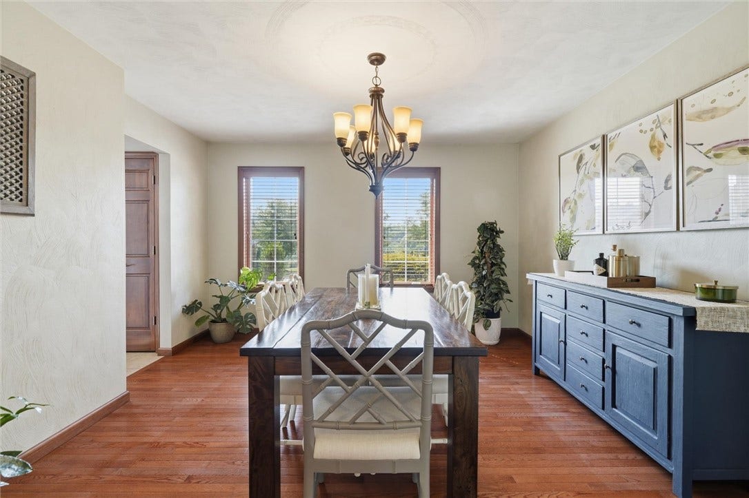 13x13 Front Facing - Open to Foyer and Kitchen with Gorgeous Hardwood Floors.