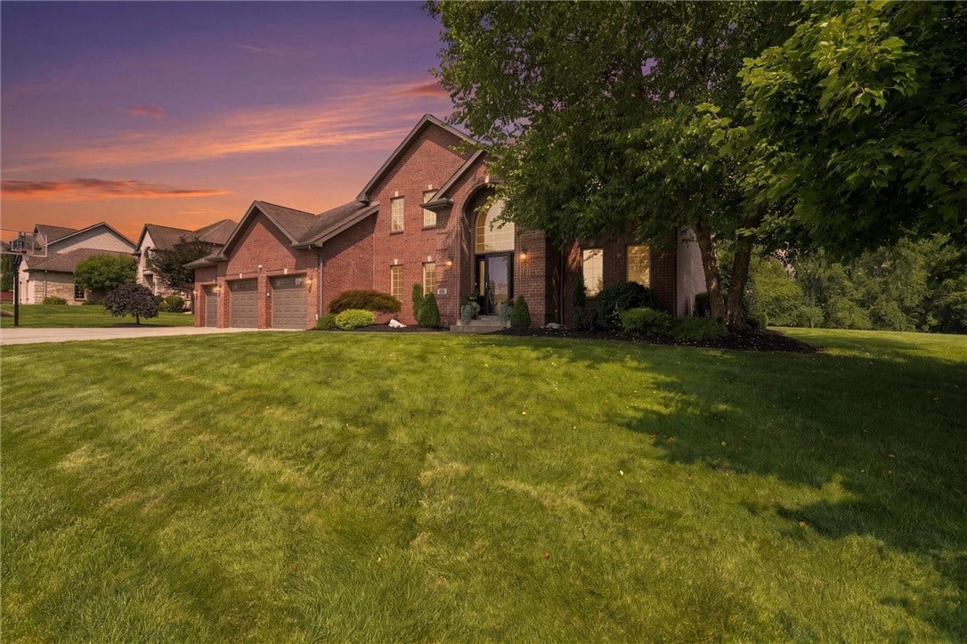Over an Acre of Beautifully Landscaped, Completely Level Ground.