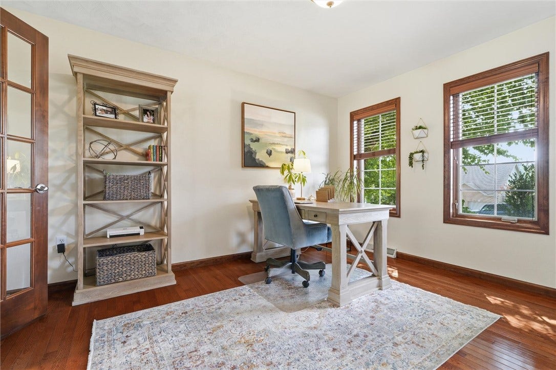 Hardwood Floors and Custom Slatted Blinds - This Multi-Purpose Room can be an Office, Playroom, or Living Room